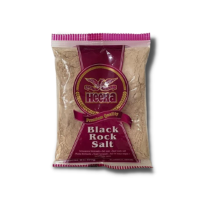 Heera Black Rock Salt Powder 100g, dark pinkish-grey powder in a clear package.