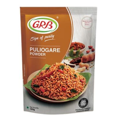 A 100g packet of GRB Puliogare Powder, a spice blend for making South Indian Puliogare.