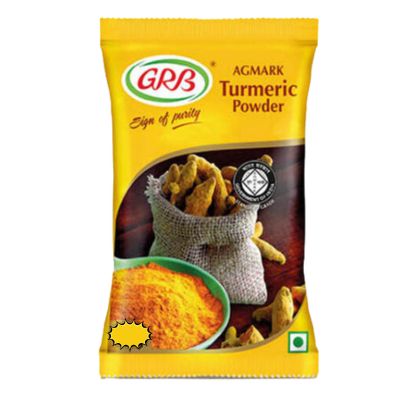 A packet of GRB Turmeric Powder, a bright yellow spice powder with a picture of turmeric roots.